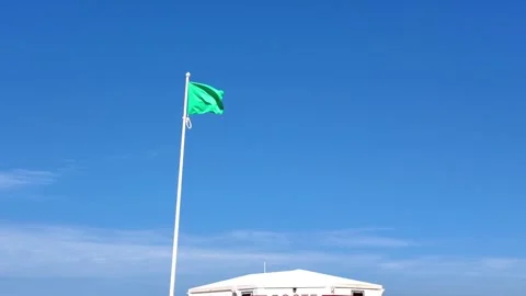 Flags fluttering along Dunkirk beach France 動画素材 342815520