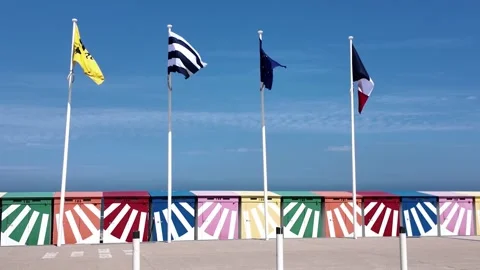 Flags fluttering along Dunkirk beach France Vídeo Stock 342815528