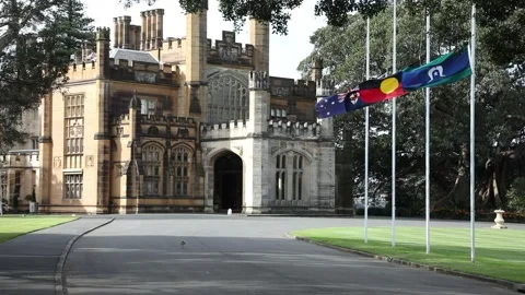 Flags fly at half-mast outside Government House Sydney Vídeos de archivo 209574709