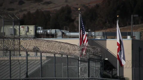 Flags flying outside of Jail Stock-Footage 37317250