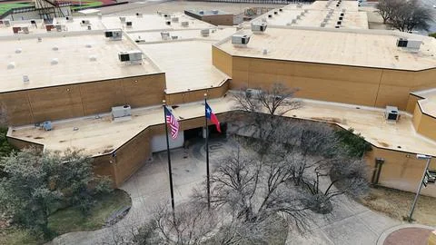 Flags in front of School Stock Photos