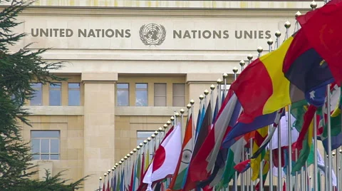 Flags in front of United Nations Organization main office in Geneva, Switzerland Video stock 64709425