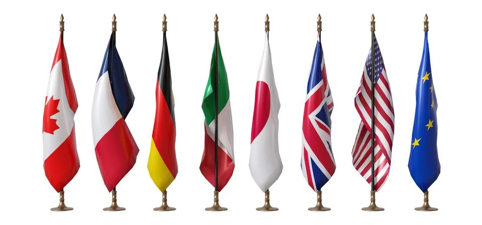 Flags from G7 countries stand tall and are cut out against a clear background Stock Photos