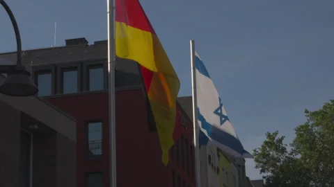 Flags of Germany and Israel in medium wind Stock Footage 337712860