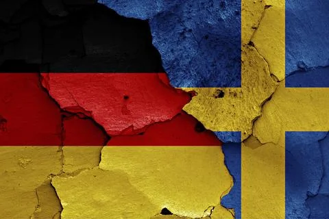 Flags of Germany and Sweden painted on cracked wall Ilustración de archivo