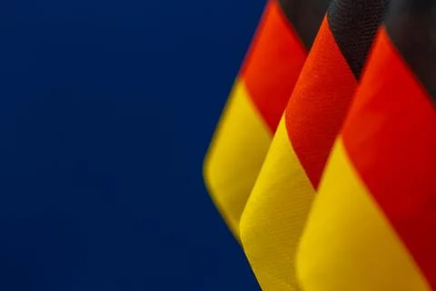 Flags of Germany with blue background and space for your project. Stock Photos