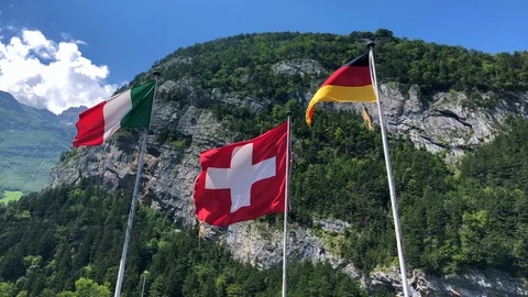 Flags of Germany Italy Switzerland. Flags are on flagpole. Vídeos de archivo 123745109