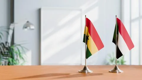 FLAGS OF GHANA AND SUDAN ON TABLE Stock Photos