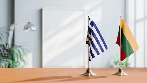 FLAGS OF GREECE AND LITHUANIA ON TABLE Stock Photos