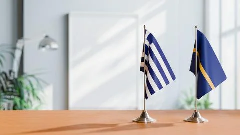 FLAGS OF GREECE AND NAURU ON TABLE Stock Photos