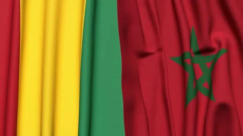 Flags of GUINEA and MOROCCO with realistic cloth texture Stock Photos