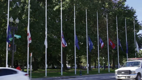 Flags at Half Staff Outside of Union Station in Washington DC in the Fall Vídeo Stock 130861539