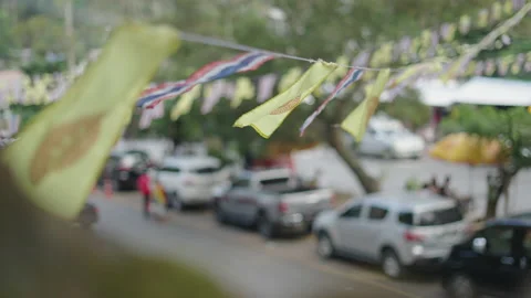 Flags hanging on street outside Bubhing Palace in Chiang Mai, Thailand Stock Footage 219022210