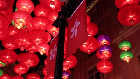 Flags of Hog Kong Special Administrative region among red, green and purple Stock Footage 163079267