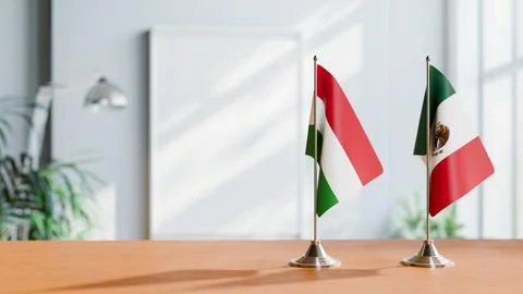 FLAGS OF HUNGARY And MEXICO ON TABLE Stock Photos