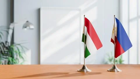 FLAGS OF HUNGARY And PHILIPPINES ON TABLE Stock Photos