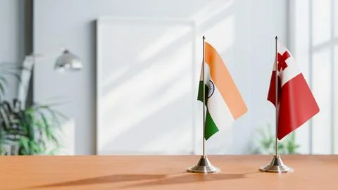 FLAGS OF INDIA And TONGA ON TABLE Stock Photos