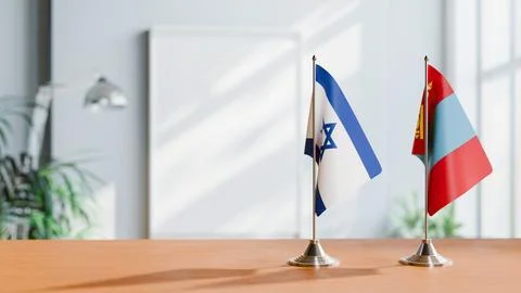 FLAGS OF ISRAEL AND MONGOLIA ON TABLE Stock Photos