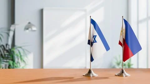 FLAGS OF ISRAEL AND PHILIPPINES ON TABLE Stock Photos