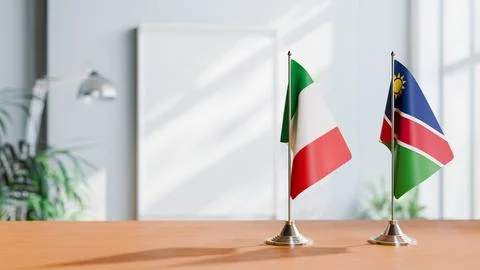 FLAGS OF ITALY AND NAMIBIA ON TABLE Stock Photos