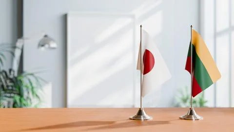 FLAGS OF JAPAN AND LITHUANIA ON TABLE Stock Photos