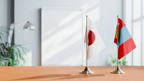 FLAGS OF JAPAN AND MONGOLIA ON TABLE Stock Photos