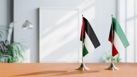 FLAGS OF JORDAN AND KUWAIT ON TABLE Stock Photos
