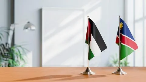 FLAGS OF JORDAN AND NAMIBIA ON TABLE Stock Photos