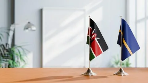 FLAGS OF KENYA AND NAURU ON TABLE Stock Photos