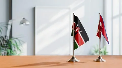 FLAGS OF KENYA AND NEPAL ON TABLE Stock Photos