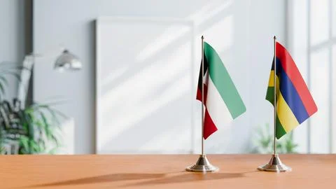 FLAGS OF KUWAIT AND MAURITIUS ON TABLE Stock Photos