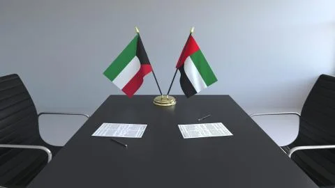 Flags of Kuwait and the UAE and papers on the table. Negotiations and signing an 스톡 일러스트