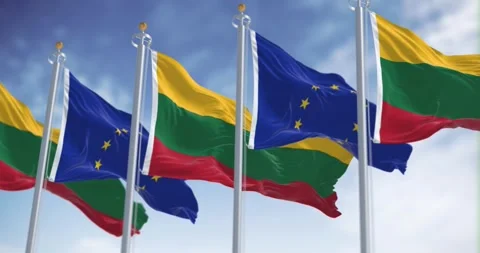 Flags of Lithuania and the European Union waving together on a clear day Stock Footage 304615751