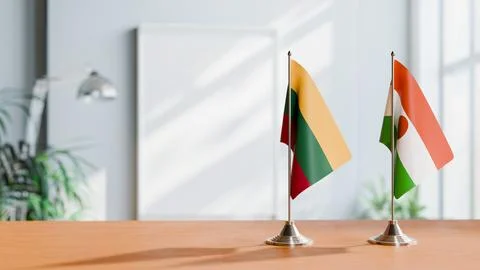 FLAGS OF LITHUANIA AND NIGER ON TABLE Stock Photos
