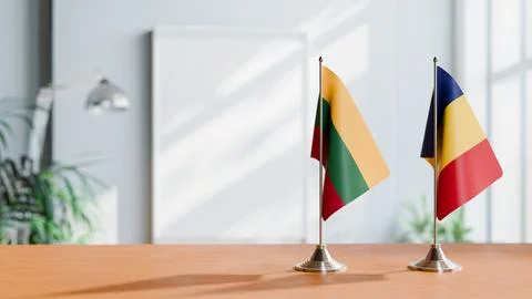 FLAGS OF LITHUANIA AND ROMANIA ON TABLE Stock Photos