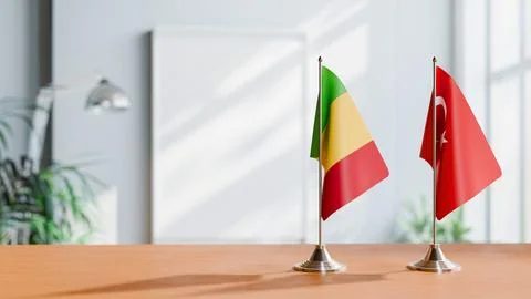 FLAGS OF MALI AND TURKEY ON TABLE Stock Photos