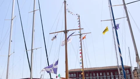 Flags on Mast in Naples Harbor Stock Footage 302880585