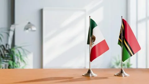 FLAGS OF MEXICO AND VANUATU ON TABLE Stock Photos