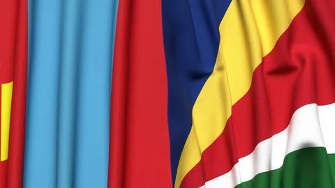 Flags of MONGOLIA and SEYCHELLES with realistic cloth texture Stock Photos