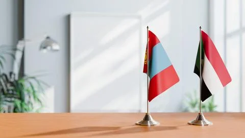 FLAGS OF MONGOLIA AND SUDAN ON TABLE Stock Photos