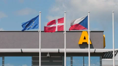Flags move in the cargo terminal in the wind. Stock Footage 133438276