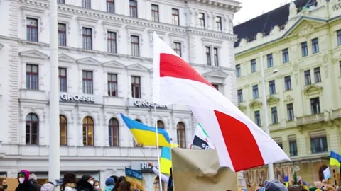 Flags moving in the wind at a protest for Ukraine in Vienna, Austria Stock Footage 171127735