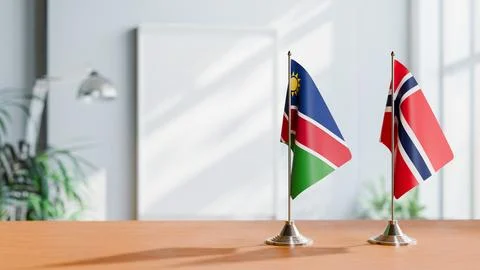 FLAGS OF NAMIBIA AND NORWAY ON TABLE Stock Photos