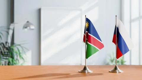 FLAGS OF NAMIBIA AND RUSSIA ON TABLE Stock Photos