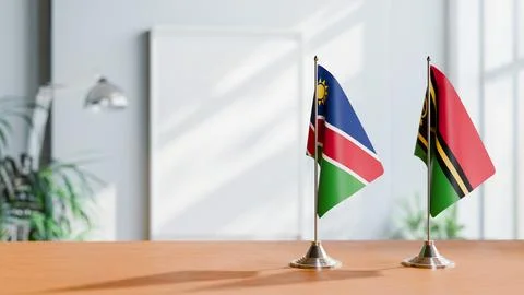 FLAGS OF NAMIBIA AND VANUATU ON TABLE Stock Photos