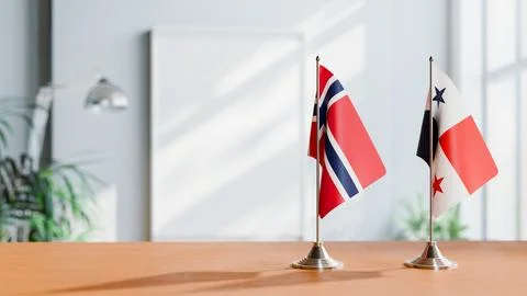 FLAGS OF NORWAY AND PANAMA ON TABLE Stock Photos
