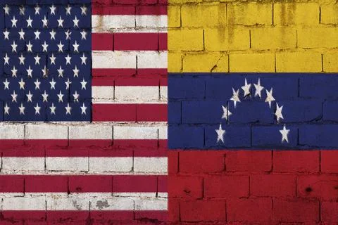 Flags Painted On Brick Wall: United States And Venezuela National Colors In Stre Stock Photos
