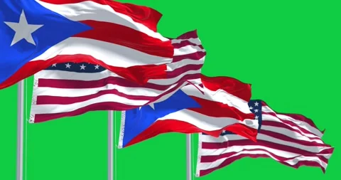Flags of Puerto Rico waving with the US flags isolated on green background Stock Footage 296839287