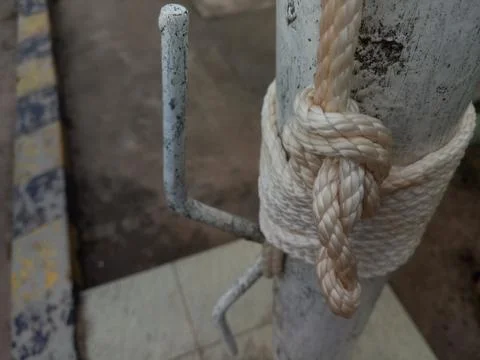 Flag's rope attachment to the pole Stock Photos