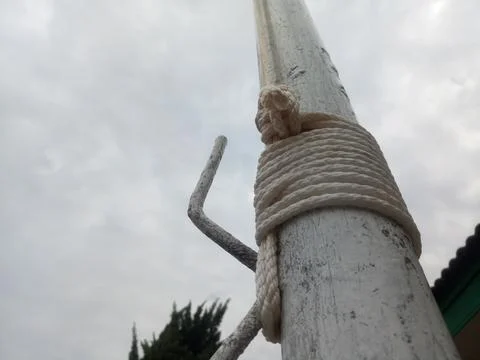 Flag's rope attachment to the pole Stock Photos